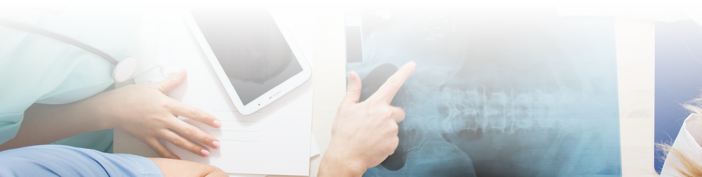 Image of young doctors analyzing pelvis x-ray